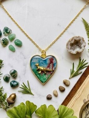 Gold Heart Pendant Necklace with Blue & Green Enamel and Gold Dinosaur Accent